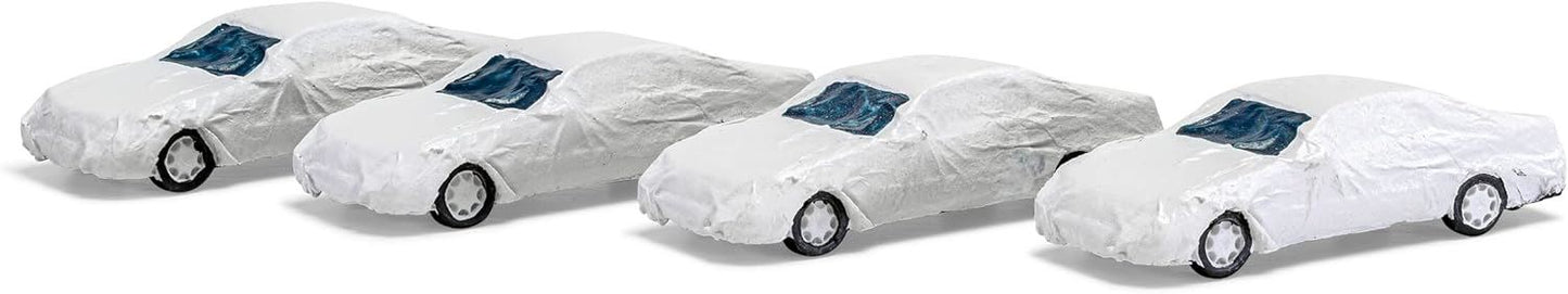 Heico 4 unit set Cars under white tarpaulin, H0 scale